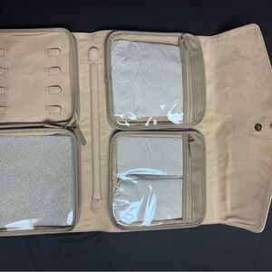 Kendra Scott Beige Travel Jewelry Roll with Clear Zip Pockets
